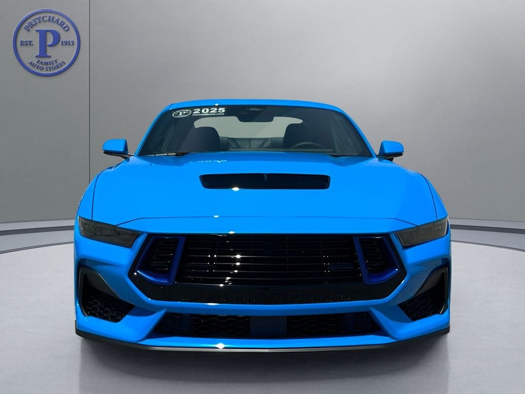 2025 Ford Mustang GT Premium in Grabber Blue Metallic — front three-quarter view