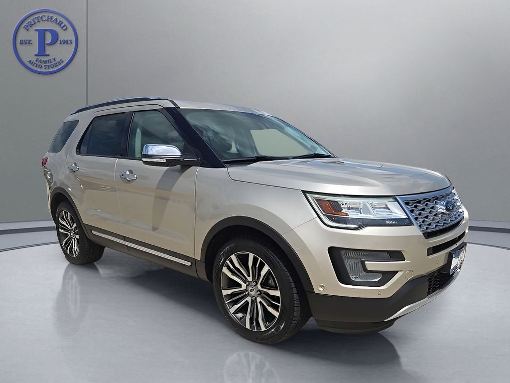 2017 Ford Explorer Platinum in White Gold Metallic — front three-quarter view