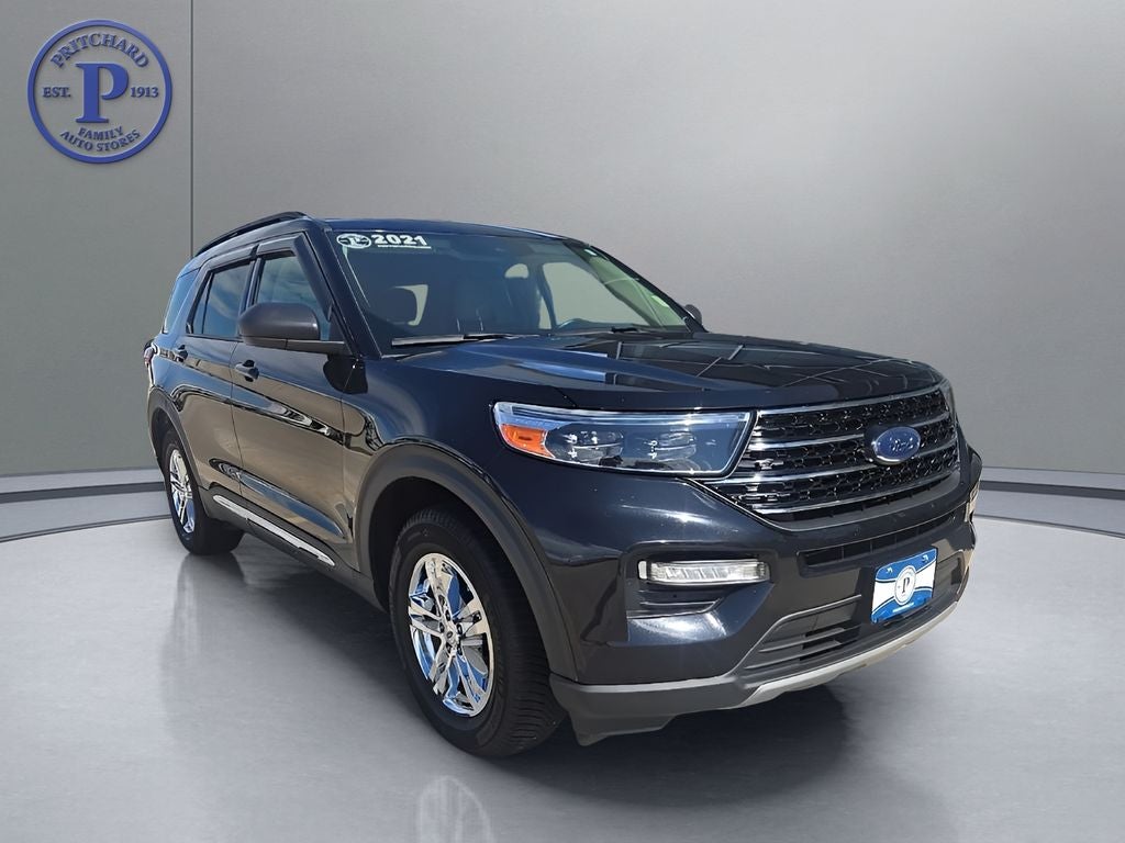 2021 Ford Explorer XLT in Black — front three-quarter view