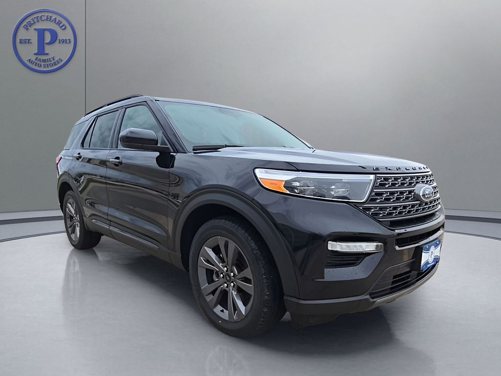 2023 Ford Explorer XLT in Black Metallic — front three-quarter view