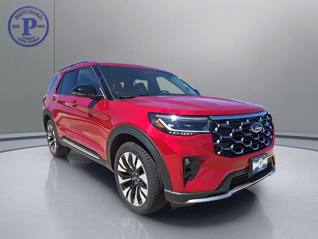 2026 Ford Explorer Platinum in Rapid Red Metallic Tinted Clearcoat — front three-quarter view