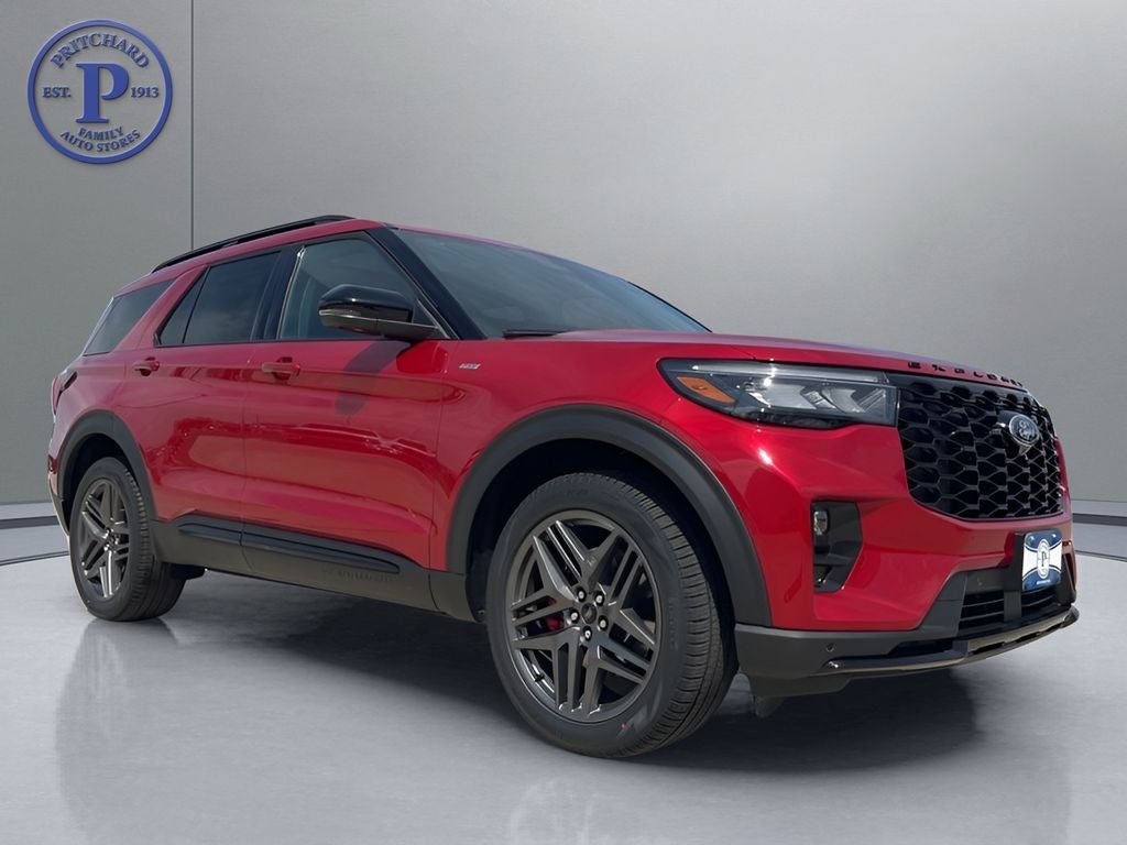 2026 Ford Explorer ST-Line in Rapid Red Metallic Tinted Clearcoat — front three-quarter view