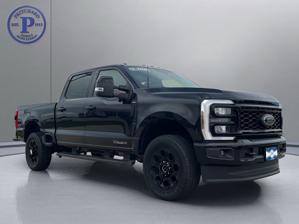 2026 Ford Super Duty F-350 Lariat in Agate Black Metallic — front three-quarter view