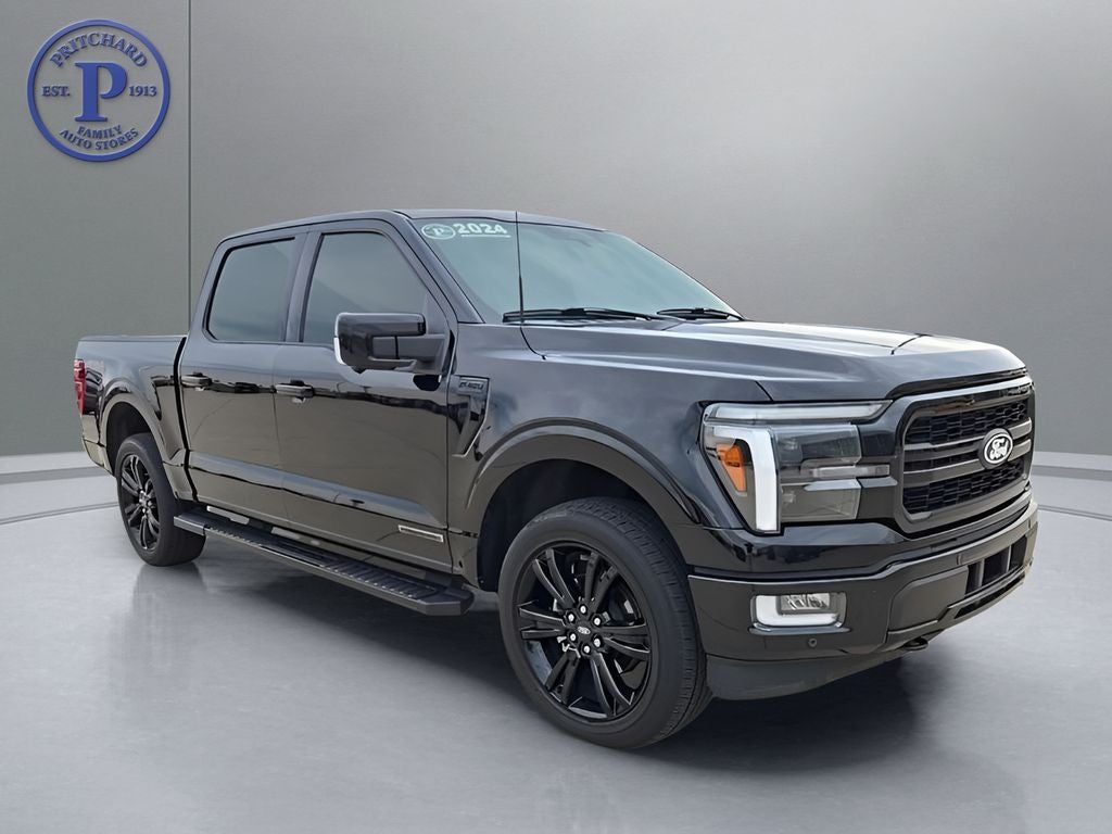2024 Ford F-150 Lariat in Black Metallic — front three-quarter view