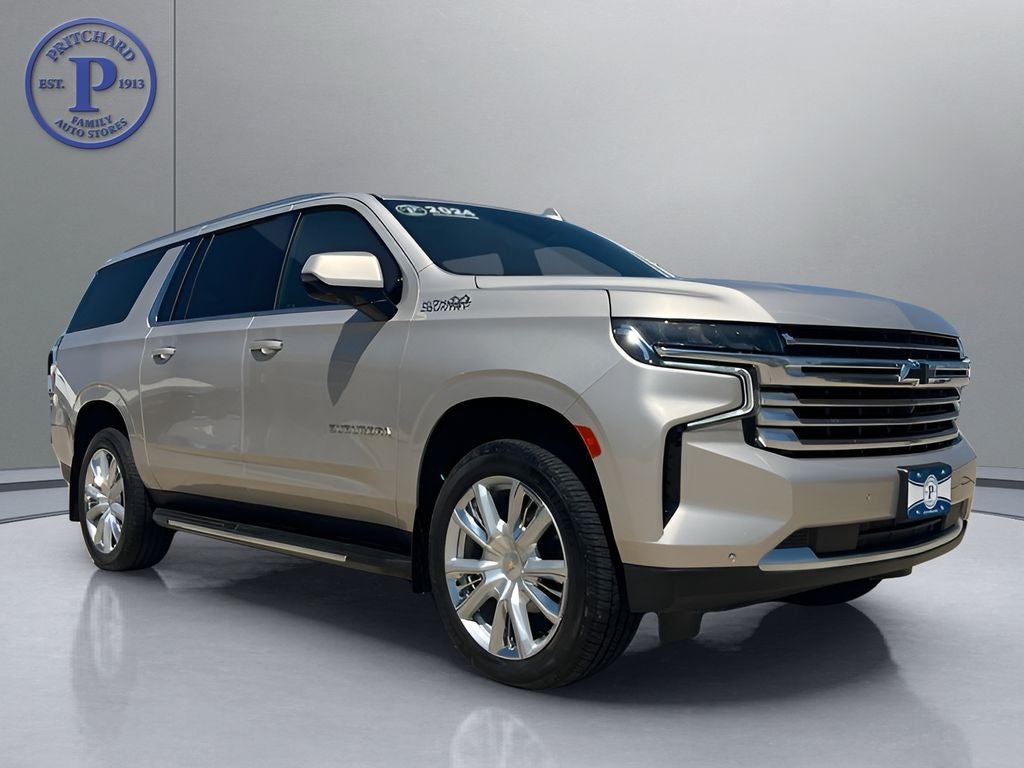 2024 Chevrolet Suburban High Country in Empire Beige Metallic — front three-quarter view