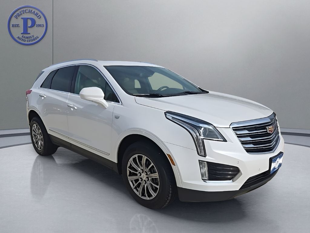 2017 Cadillac XT5 Luxury in Crystal White Tricoat — front three-quarter view