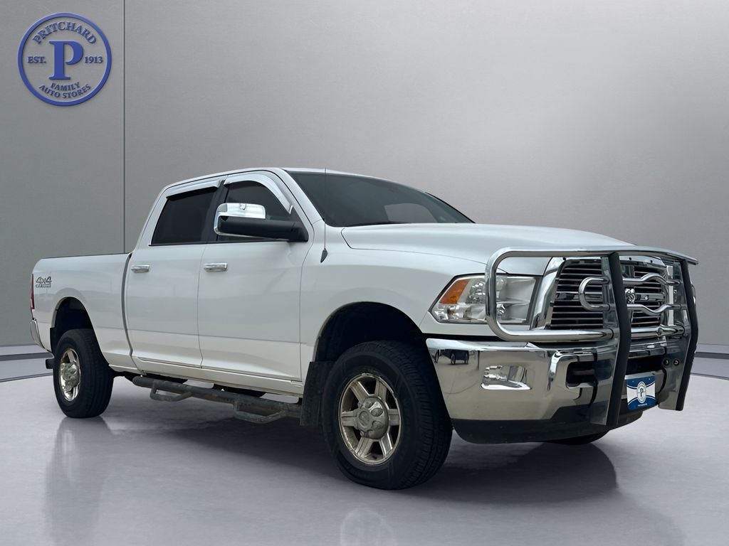 2011 RAM 2500 Laramie in Bright White Clearcoat — front three-quarter view