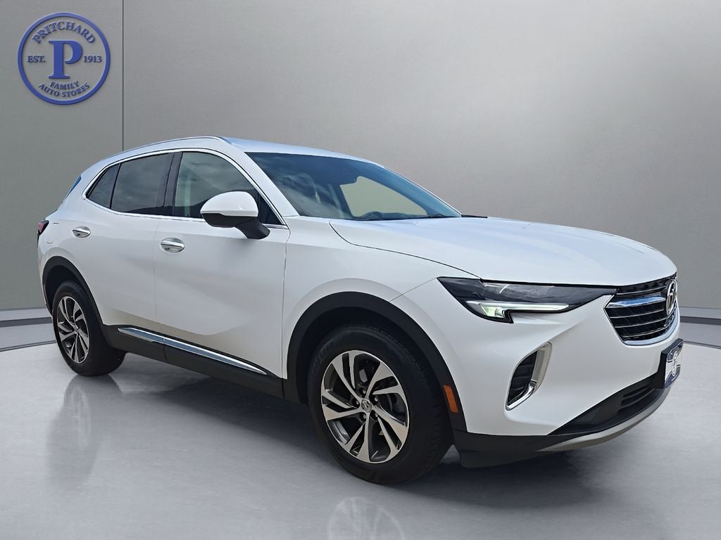 2023 Buick Envision Essence in Summit White — front three-quarter view